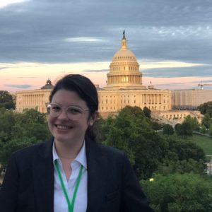 An informal portrait of Ollie in front of the Capitol in Washington, D.C.